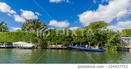 Luxury boat motor yacht in marina. Luxury yacht. Boating and yachting tourism. Luxurious lifestyle. Vacation on summer. Docked yacht at private area. Sea vacation on summer. Private dock Luxury boat motor yacht in marina. Luxury yacht. Boating and yachting tourism. Luxurious lifestyle. Vacation on summer. Docked yacht at private area. Sea vacation on summer. Private dock 134437722