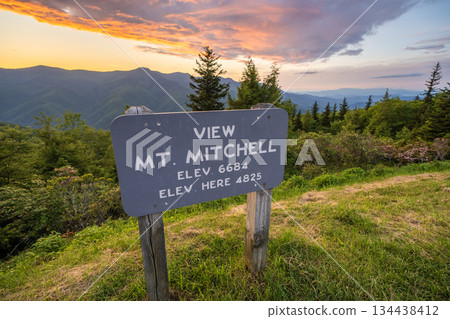 Car road trip on Blue Ridge Parkway in North Carolina Appalachian mountains. Mt Mitchell Overlook in summer season at sunset. Summertime landscape of beautiful nature 134438412