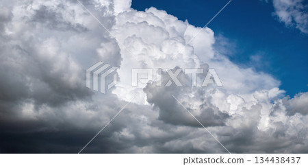 Blue sky with white clouds. Bright summer skyscape Blue sky with white clouds. Bright summer skyscape 134438437