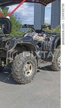 This image features a rugged all-terrain vehicle designed for off-road adventures. Ideal for outdoor exploration, recreation, or vehicle service promotions with a focus on adventure. This image features a rugged all-terrain vehicle designed for off-road adventures. Ideal for outdoor exploration, recreation, or vehicle service promotions with a focus on adventure. 134438736