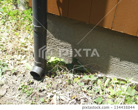 Downspout of an old house 134438844
