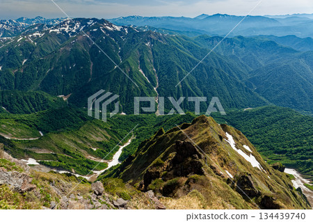 View of Mount Asahi, the Echigo Sanzan, and the Oze mountain range from Mount Tanigawa, Mount Oki no Mimi, and Mount Ichinokura View of Mount Asahi, the Echigo Sanzan, and the Oze mountain range from Mount Tanigawa, Mount Oki no Mimi, and Mount Ichinokura 134439740