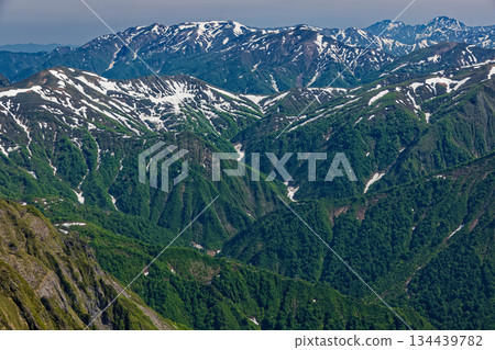Snow-covered Shimizu Pass, Mt. Makihata, and the Echigo Sanzan mountains seen from the Oki-no-mimi ridge of Mt. Tanigawa Snow-covered Shimizu Pass, Mt. Makihata, and the Echigo Sanzan mountains seen from the Oki-no-mimi ridge of Mt. Tanigawa 134439782