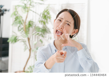 A woman in her 40s who is very angry 134440464