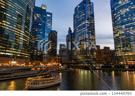 Night city of Chicago. Business city. Night cityscape of Chicago skyscraper building. Chicago architecture of skyscraper. City night illuminated building. Skyscraper cityscape. Hustling streets 134440765