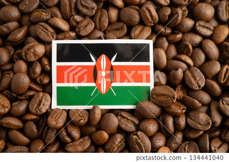 Kenya flag on coffee beans, shopping online for export or import food product. Kenya flag on coffee beans, shopping online for export or import food product. 134441040
