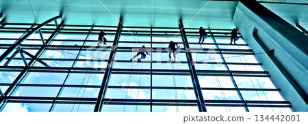 extreme work cleaning airport windows at height 134442001