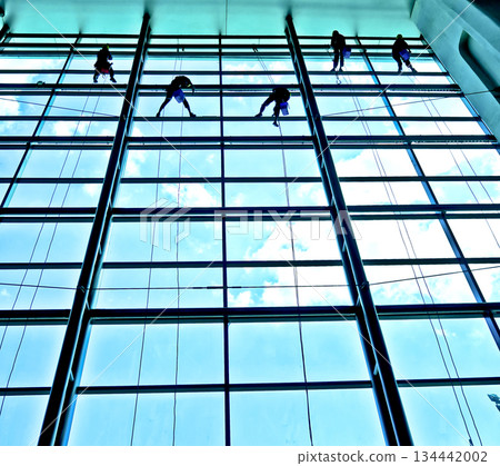extreme work cleaning airport windows at height 134442002