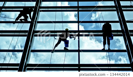 extreme work cleaning airport windows at height 134442014