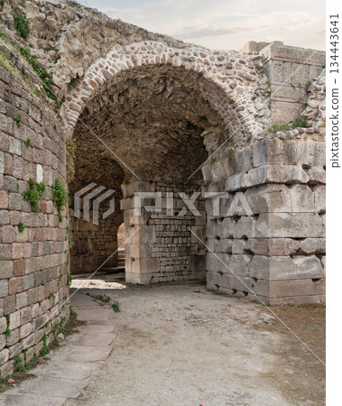 Ancient stone arches and walls at the historic ruins of Pergamon, Bergama, Turkey. 134443641