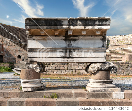 Ancient Greek inscription on monumental stone ruins with theater, Acropolis of Pergamon, Bergama, Turkey 134443642