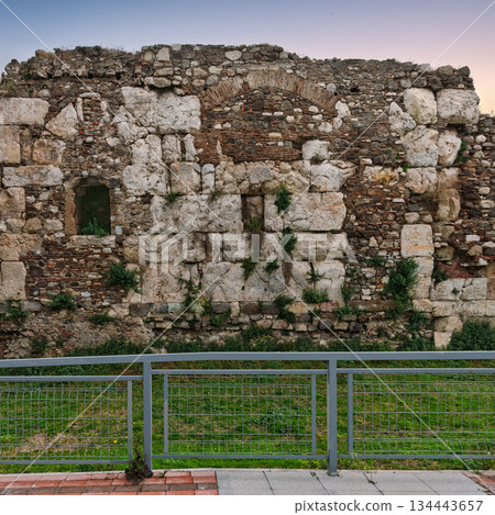Weathered stone wall of Ancient Roman Agora of Smyrna ruins, Izmir, Turkey. Weathered stone wall of Ancient Roman Agora of Smyrna ruins, Izmir, Turkey. 134443657