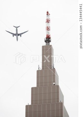 Antennas and jetliners installed on top of skyscrapers 134445441
