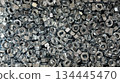 Metal nuts background for industrial and construction concept 134445470