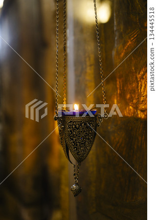 Intricate Antique Orthodox Oil Lamps Hanging in Stone Church 134445518