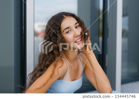 Smiling Generation Alpha Girl With Smartphone 134445746
