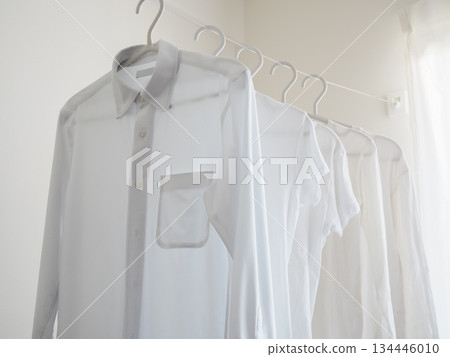 Laundry hanging out to dry in the room Laundry hanging out to dry in the room 134446010