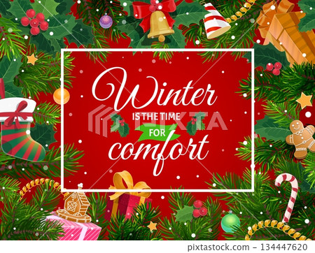 Christmas greeting card with pine tree decorations holly berry gifts and winter is the time for comfort quote, surrounded by festive fir branches, baubles, candy cane, gingerbread on snowy background Christmas greeting card with pine tree decorations holly berry gifts and winter is the time for comfort quote, surrounded by festive fir branches, baubles, candy cane, gingerbread on snowy background 134447620