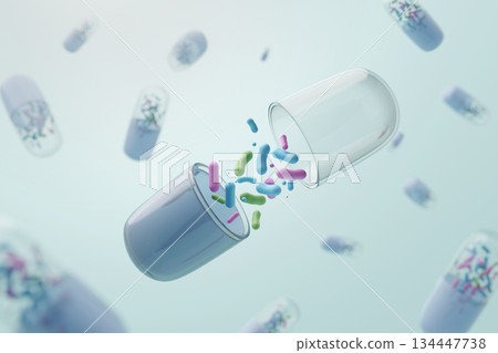 Lactic acid bacteria and bifidobacteria spread from supplement capsules. Intestinal health image. Lactic acid bacteria and bifidobacteria spread from supplement capsules. Intestinal health image. 134447738