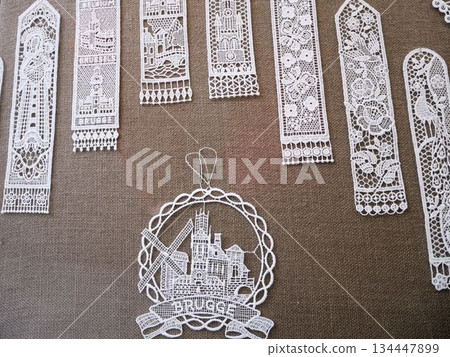 A beautiful lace bookmark, a tourist souvenir from Bruges (Belgium) 134447899