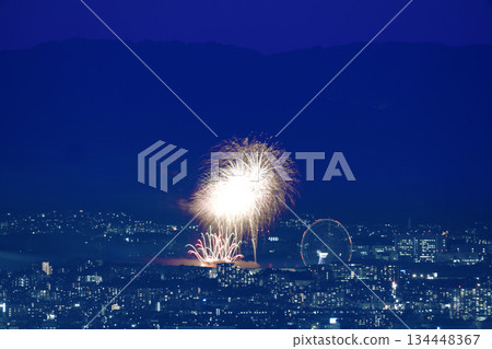 Fireworks and Ferris wheel view from the observation deck Fireworks and Ferris wheel view from the observation deck 134448367