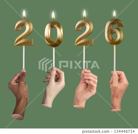 Diverse hands holding golden 2026 candles for New Year celebration. 134448714