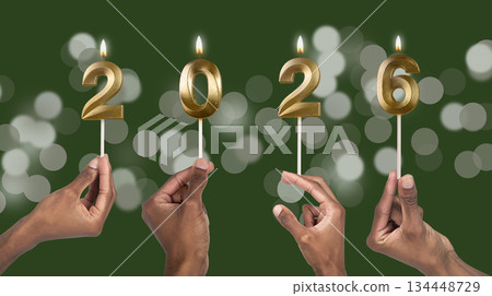 Hands holding shiny 2026 candle digits, concept of celebration, hope, new opportunities, and joyful 134448729
