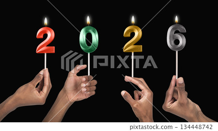 Human hands holding shiny 2026 candles as a symbol of coming New Year celebration and joyful 134448742