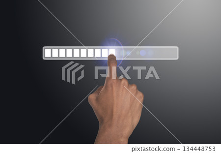 Loading bar developing process. Hand of African American man touching digital screen, symbol of AI Loading bar developing process. Hand of African American man touching digital screen, symbol of AI 134448753