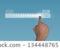 Loading bar transition. Hand of African American man pointing toward 2026 goal, symbol of new year 134448765