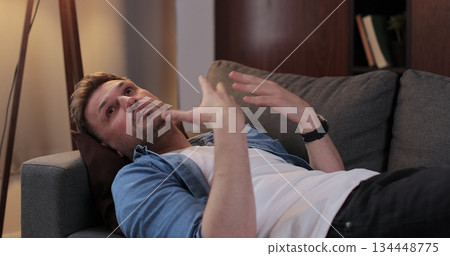 Man, sad and talking to therapist, counselling and help for mental health or medical appointment. Clinic, psychologist or consultation for patient with trauma, depression. Man, sad and talking to therapist, counselling and help for mental health or medical appointment. Clinic, psychologist or consultation for patient with trauma, depression. 134448775