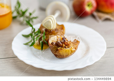Delicious rustic baked apple dessert with caramelized honey glaze Delicious rustic baked apple dessert with caramelized honey glaze 134449894