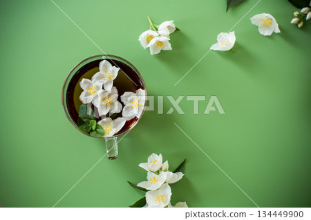 Green tea with jasmine in a glass teapot from above 134449900