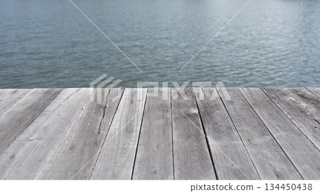 weathered wooden planks with river view weathered wooden planks with river view 134450438