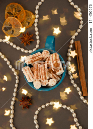 Coffee with marshmallows and carcin and star anise. 134450976