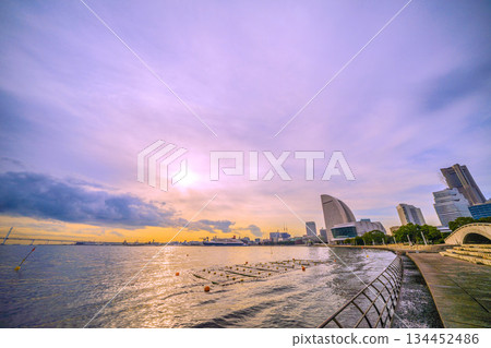 Yokohama cityscape in Japan. Three Japanese luxury cruise ships gather at Yokohama Port. View of Nippon Maru, Mitsui Ocean Fuji, Asuka II, etc. Yokohama cityscape in Japan. Three Japanese luxury cruise ships gather at Yokohama Port. View of Nippon Maru, Mitsui Ocean Fuji, Asuka II, etc. 134452486
