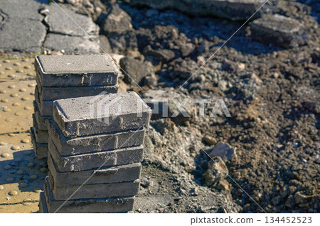 Paving slabs folded by side.Repair construction road 134452523