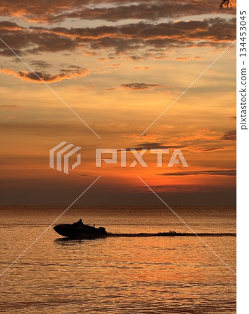 sunset over the sea 134453045