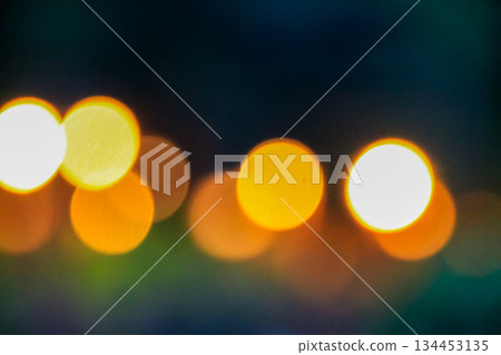 The bokeh effect of the Hong Kong city light at night, the view from Victoria Harbor. Abstract lighting scene, night cityscape. 134453135