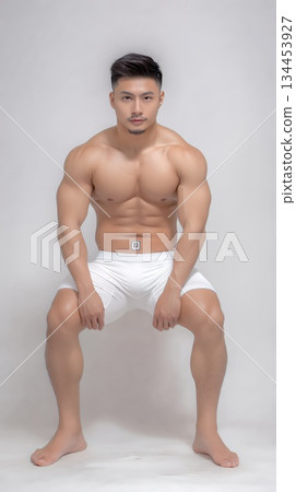young muscular man in studio young muscular man in studio 134453927