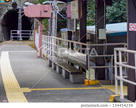 A journey filled with emotions on an empty platform. A quiet time waiting for the train. Quiet Station Platform A journey filled with emotions on an empty platform. A quiet time waiting for the train. Quiet Station Platform 134454239