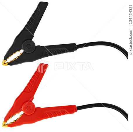 Battery probes, crocodile clips, red and black, on a white background in insulation Battery probes, crocodile clips, red and black, on a white background in insulation 134454522