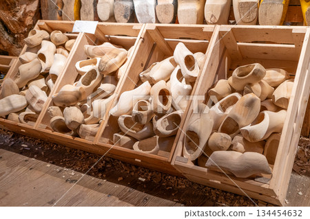 Clomps wooden shoes. Clogs slippers souvenir. Holland gift traditional footwear in Netherlands 134454632