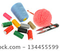 Colorful Sewing and Knitting Supplies with Threads and Yarn 134455599