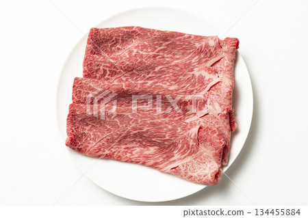 Beef on a white plate White background 134455884