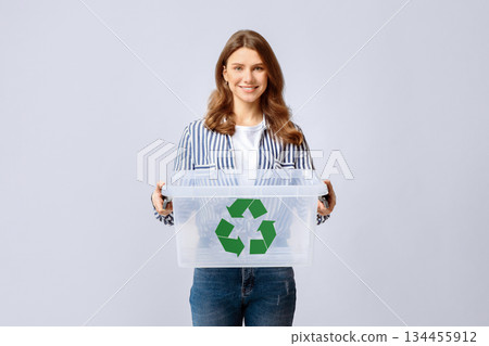 Smiling Young Woman Holding Empty Plastic Container With Green Recycle Sign Icon, Positive Millennial Woman Enjoying Zero Waste Living And Garbage Sorting, Standing Over Light Background, Copy Space Smiling Young Woman Holding Empty Plastic Container With Green Recycle Sign Icon, Positive Millennial Woman Enjoying Zero Waste Living And Garbage Sorting, Standing Over Light Background, Copy Space 134455912
