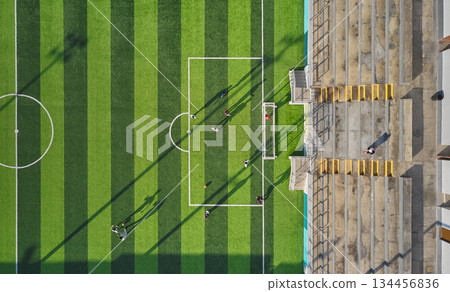 Aerial view soccer field with players practicing 134456836