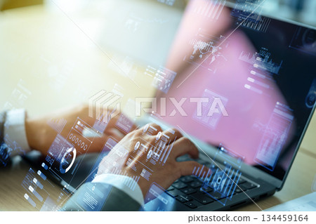 The hands of a businessman manipulating digital data 134459164
