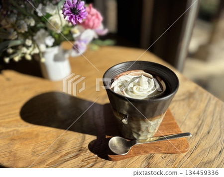 Viennese coffee placed by the window 134459336