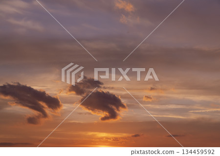 multi-colored sunset with different colors and clouds as the sun sets over the horizon, multi-colored sky with warm colors and a touch of sunset or sunrise multi-colored sunset with different colors and clouds as the sun sets over the horizon, multi-colored sky with warm colors and a touch of sunset or sunrise 134459592
